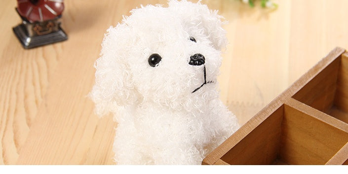 Teddy dog toy close-up — soft fabric with squeaker inside