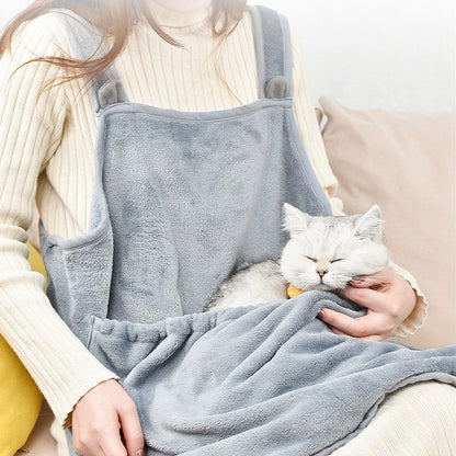 Cat carrier apron front view — cat tucked inside against chest